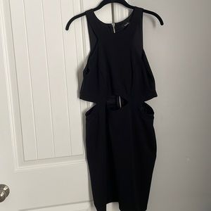 Black dress **cutouts on sides.